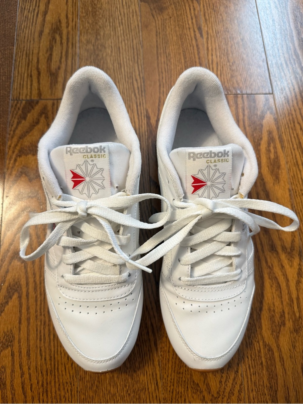 Reebok White Sneakers with Red Logo Accent
